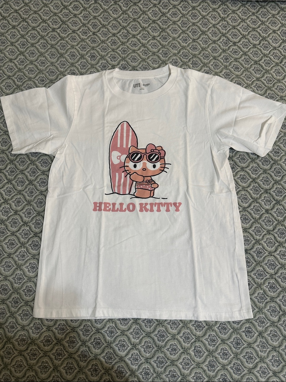 Uniqlo White Hello Kitty Tee with Pink Surf Graphic